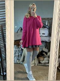 Pull oversize frangé fushia