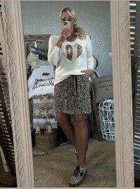 Pull fil love léopard blanc