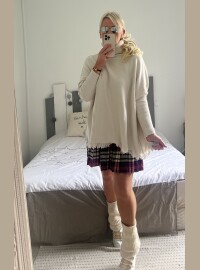 Pull col roulé frange écru