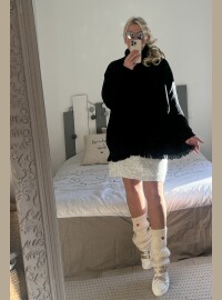 Pull col roulé frange noir