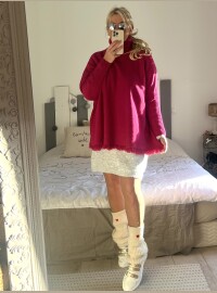 Pull col roulé frange fushia