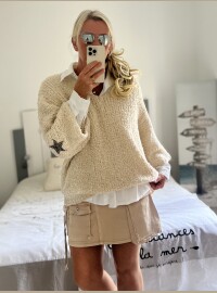 Pull star bouclettes crème